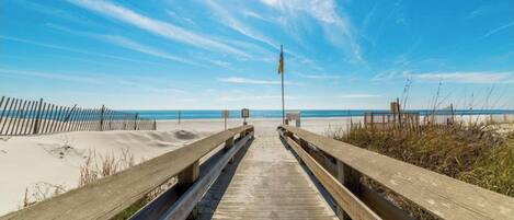 On the beach, sun-loungers