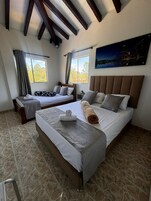 Family Quadruple Room | Down comforters, desk, free WiFi, bed sheets