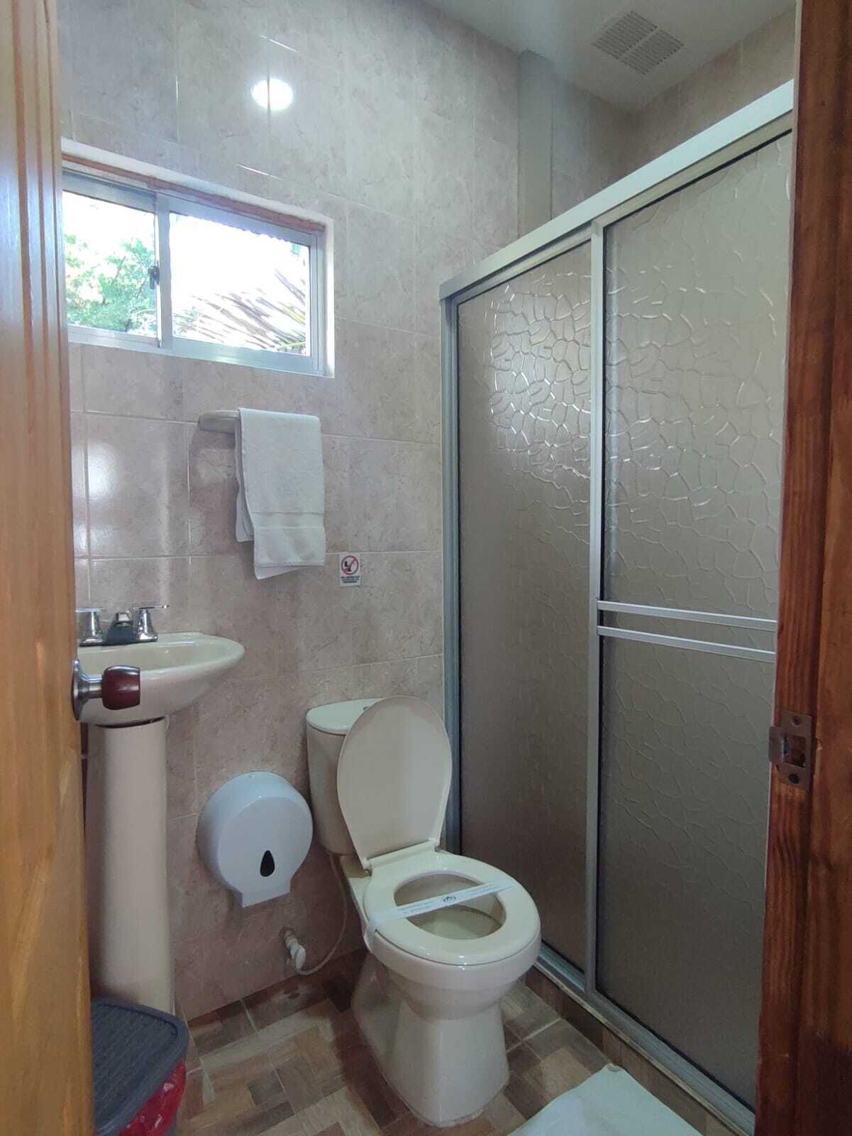 deluxe double room, 1 double bed | bathroom | shower, rainfall showerhead, towels, soap