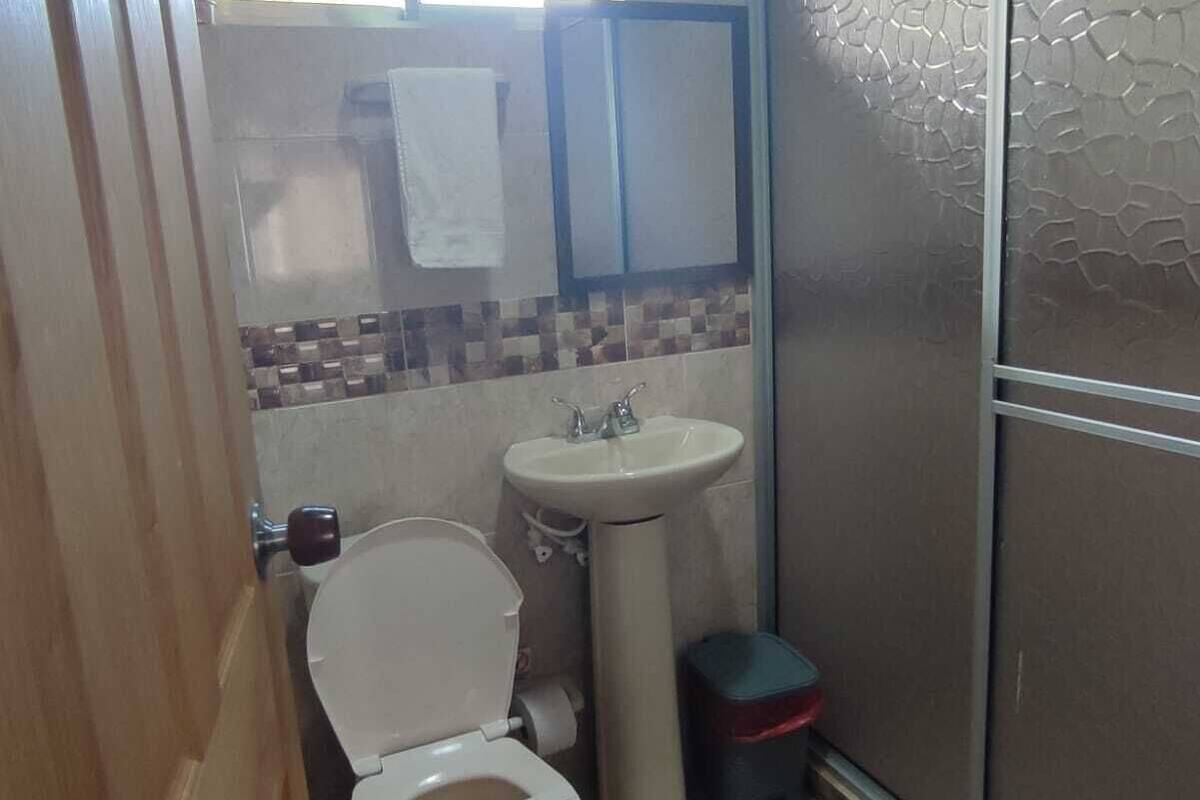 family quadruple room | bathroom | shower, rainfall showerhead, towels, soap