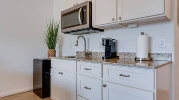 Fridge, microwave, coffee/tea maker, toaster