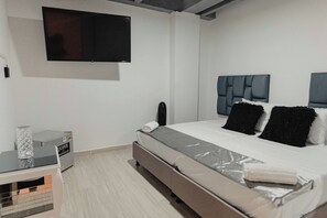 4 dormitorios, tabla de planchar con plancha, wifi gratis y ropa de cama
