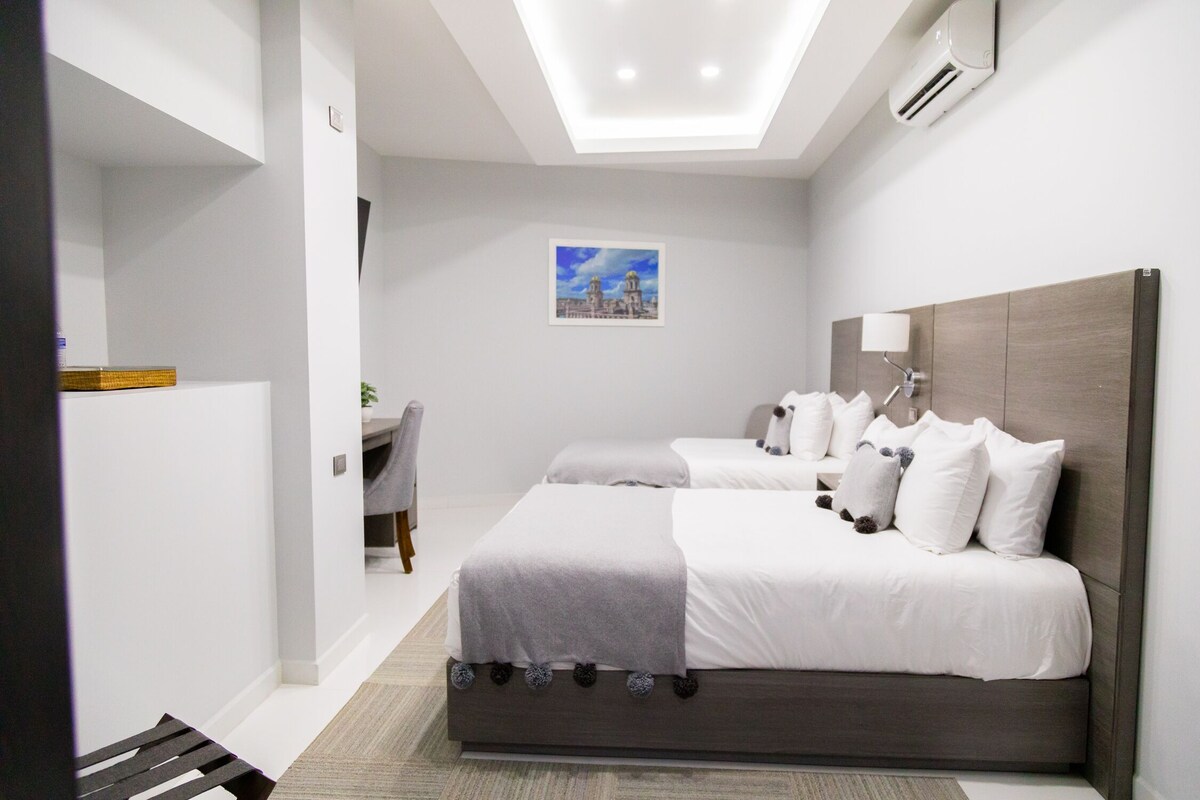 Premium bedding, down duvets, Select Comfort beds, in-room safe