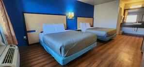 Tabla de planchar con plancha, wifi gratis, ropa de cama
