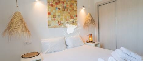 2 dormitorios, tabla de planchar con plancha, wifi gratis y ropa de cama