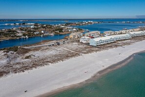 On the beach, sun loungers, beach towels