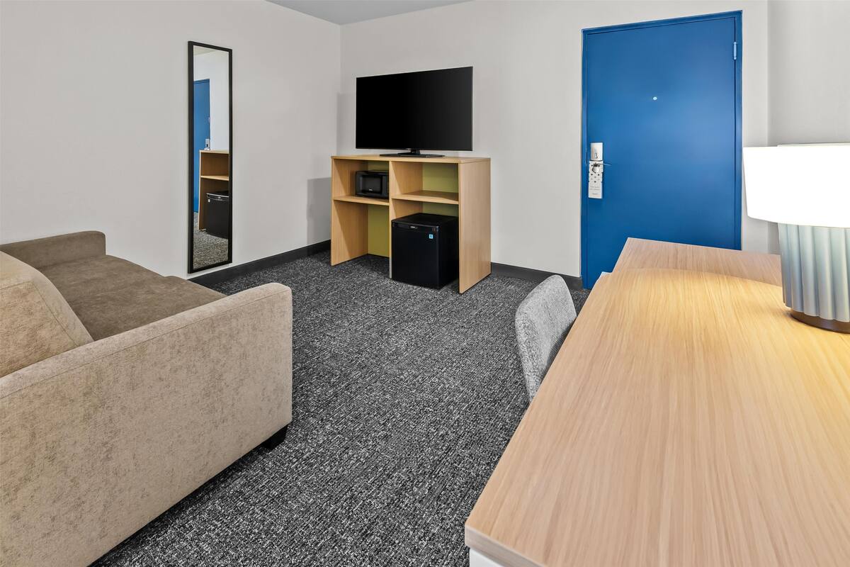 Suite, 1 King-Bett und Schlafsofa | Wohnbereich