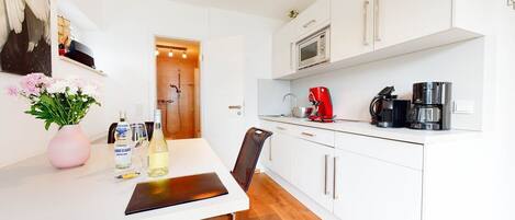 Fridge, microwave, dishwasher, coffee/tea maker