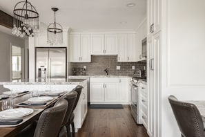 Condo, 4 Bedrooms | Private kitchen | Fridge, coffee/tea maker, toaster