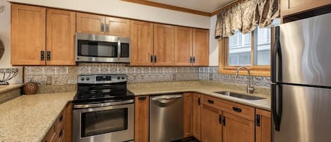 Condo, 3 Bedrooms | Private kitchen | Fridge, coffee/tea maker, toaster