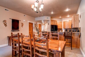 Enjoy cooking and dining in this well-equipped kitchen with a central island and appliances.