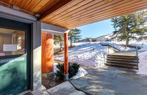 Guests can access the locker room and parking area via the exterior stairs.