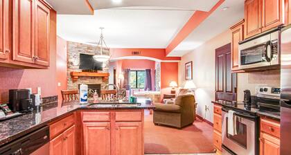 Spacious condo & studio with fireplaces, full kitchen, jetted tub, AC, & balcony