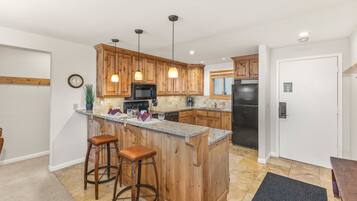 Condo, 3 Bedrooms | Private kitchen | Fridge, coffee/tea maker, toaster