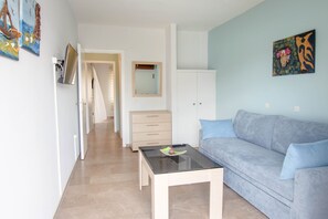 Apartamento conforto | Sala de estar | TV LCD