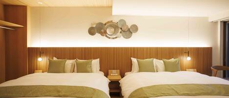 A hotel room with two beds, wooden paneling, a decorative wall piece, and bedside lamps.