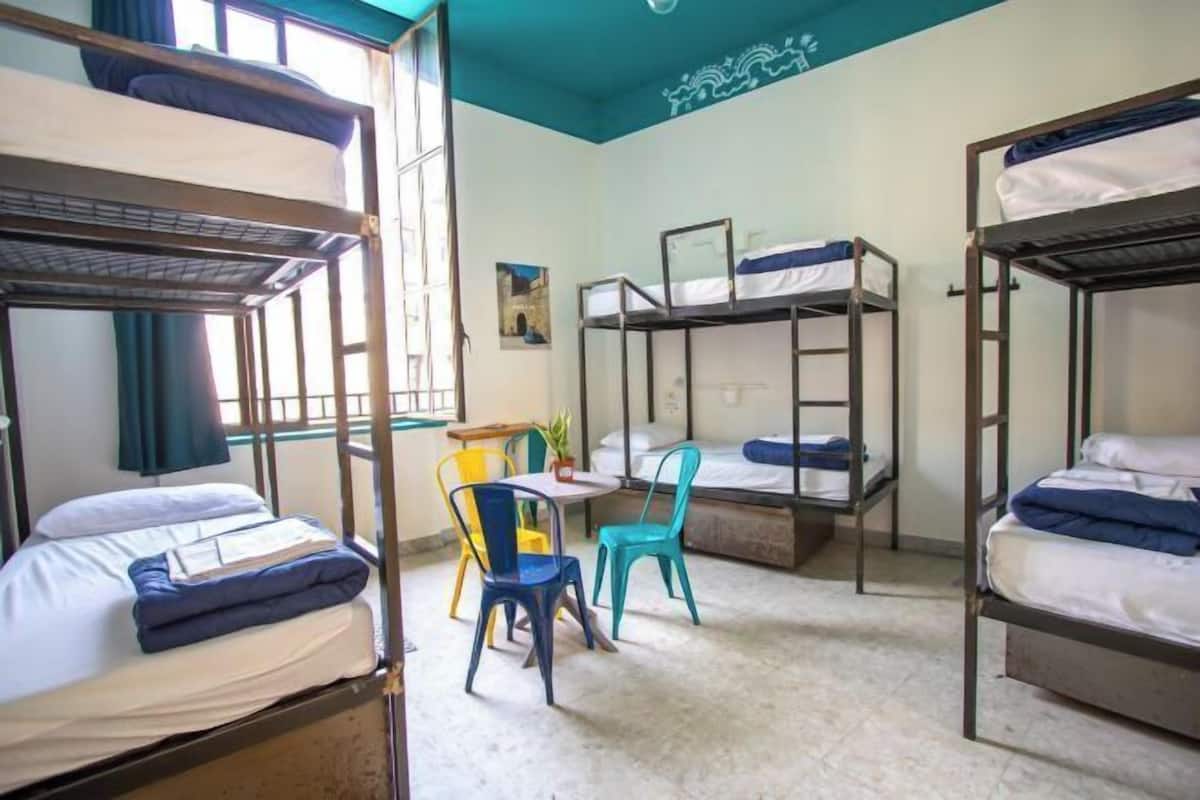 Desk, laptop workspace, free WiFi, bed sheets