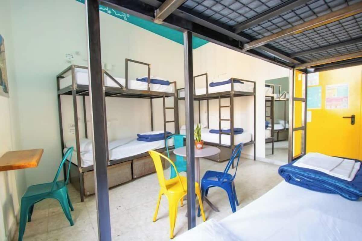 Desk, laptop workspace, free WiFi, bed sheets