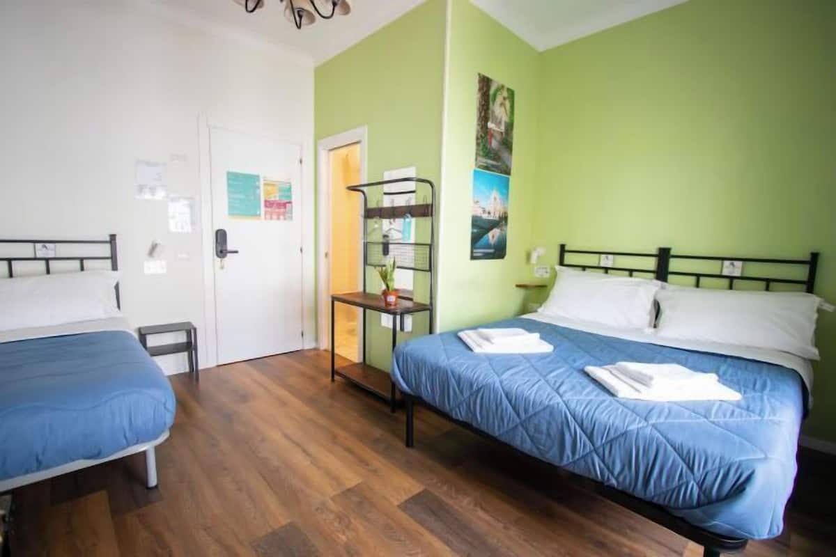 Desk, laptop workspace, free WiFi, bed sheets