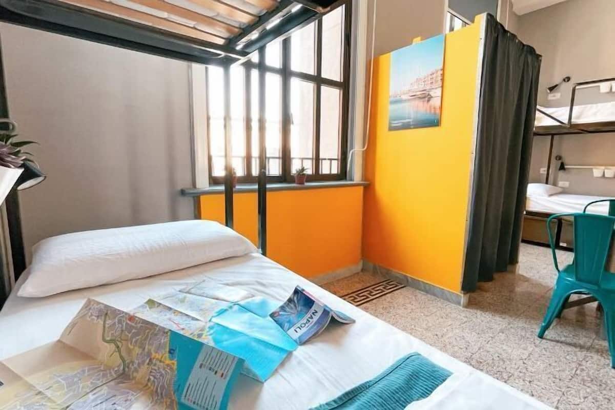 Desk, laptop workspace, free WiFi, bed sheets