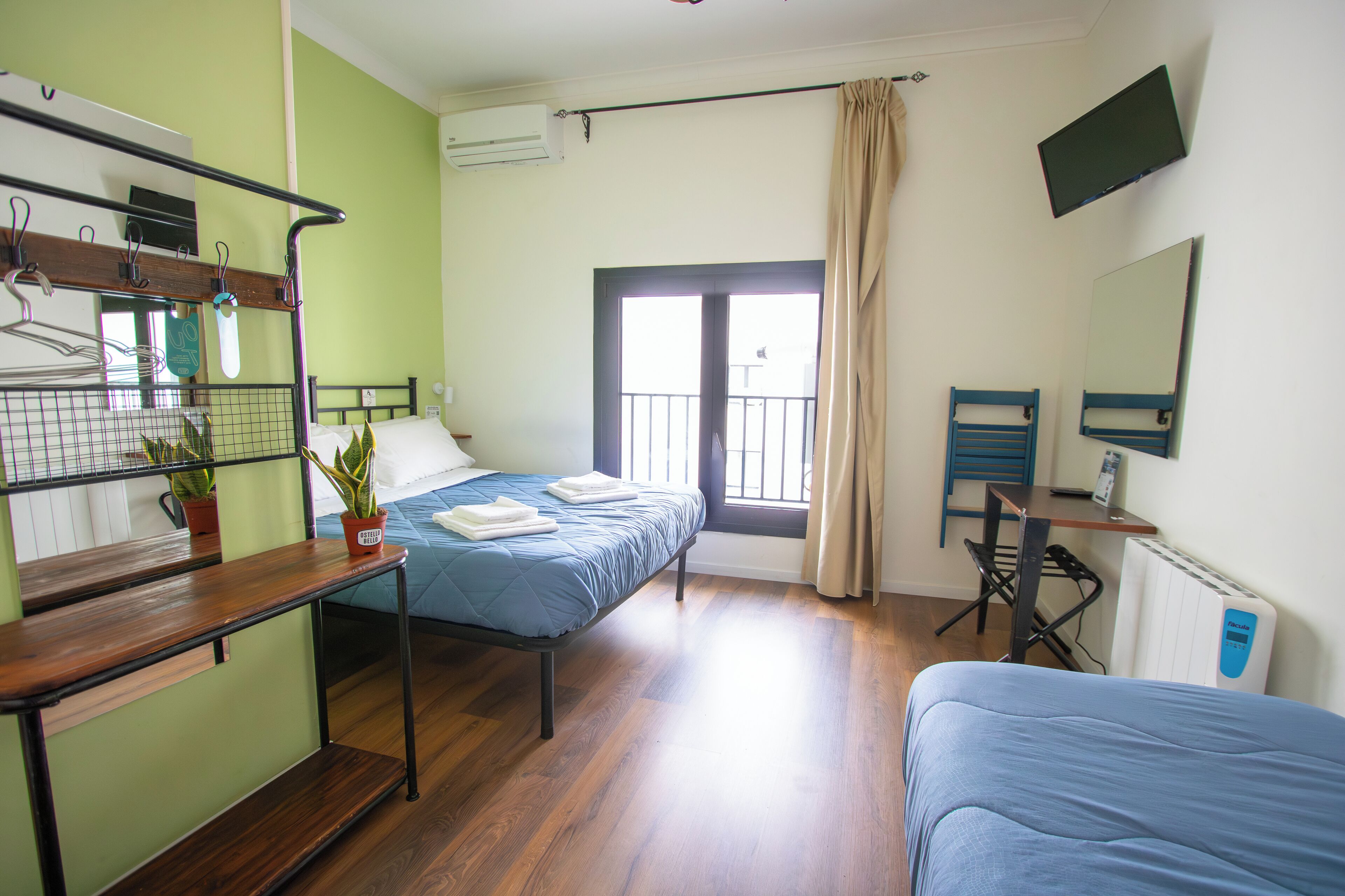 Desk, laptop workspace, free WiFi, bed sheets