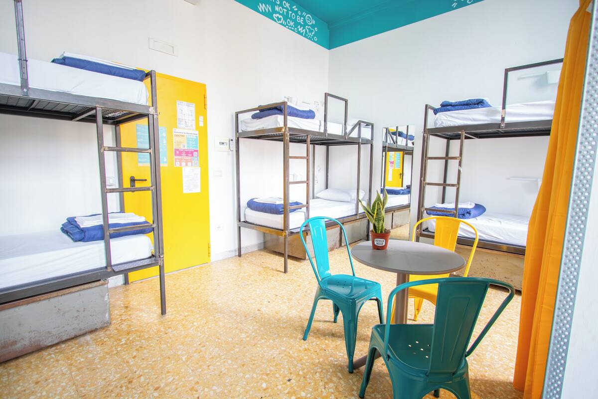 Desk, laptop workspace, free WiFi, bed sheets