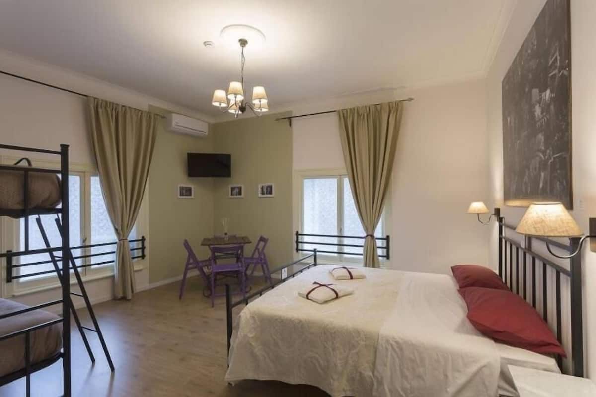 Economy Quadruple Room | Free WiFi, bed sheets, wheelchair access