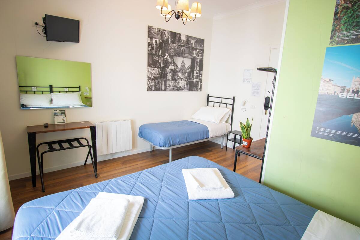 Desk, laptop workspace, free WiFi, bed sheets