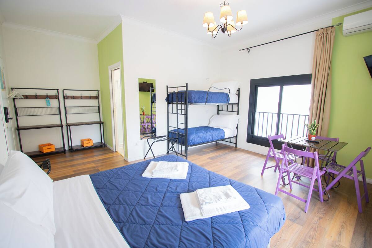 Desk, laptop workspace, free WiFi, bed sheets