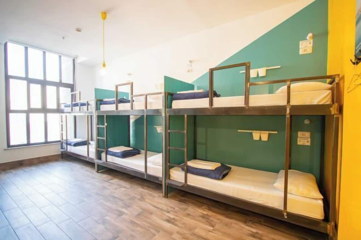 Desk, laptop workspace, free WiFi, bed sheets