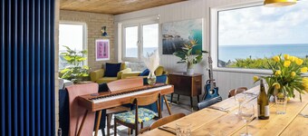 Sunset Beach House, Porthleven, with panoramic sea views. Comfortably sleeps 10