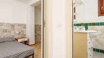 1 habitación y ropa de cama