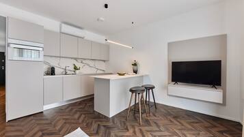 Deluxe-Suite | Eigene Küche | Kühlschrank, Mikrowelle, Ofen, Herdplatte