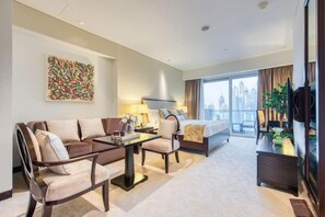 Deluxe Studio | Living area | 49-inch Smart TV with cable channels, TV, Netflix - SuperHost - Deluxe Studio with Stunning Marina Views - JW Marriott Dubai Marina (Dubai)