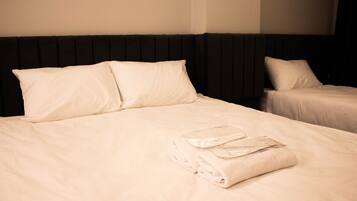 Chambre Triple | Draps italiens Frette, literie de qualité supérieure