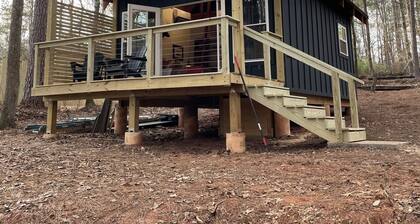 Lake Front! dock/kayaks/fire pit! This is the smaller of two cabins on property.