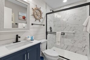 Shower, hair dryer, towels