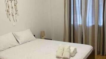 Apartamento | 2 quartos, ferros/tábuas de passar roupa, Wi-Fi de cortesia