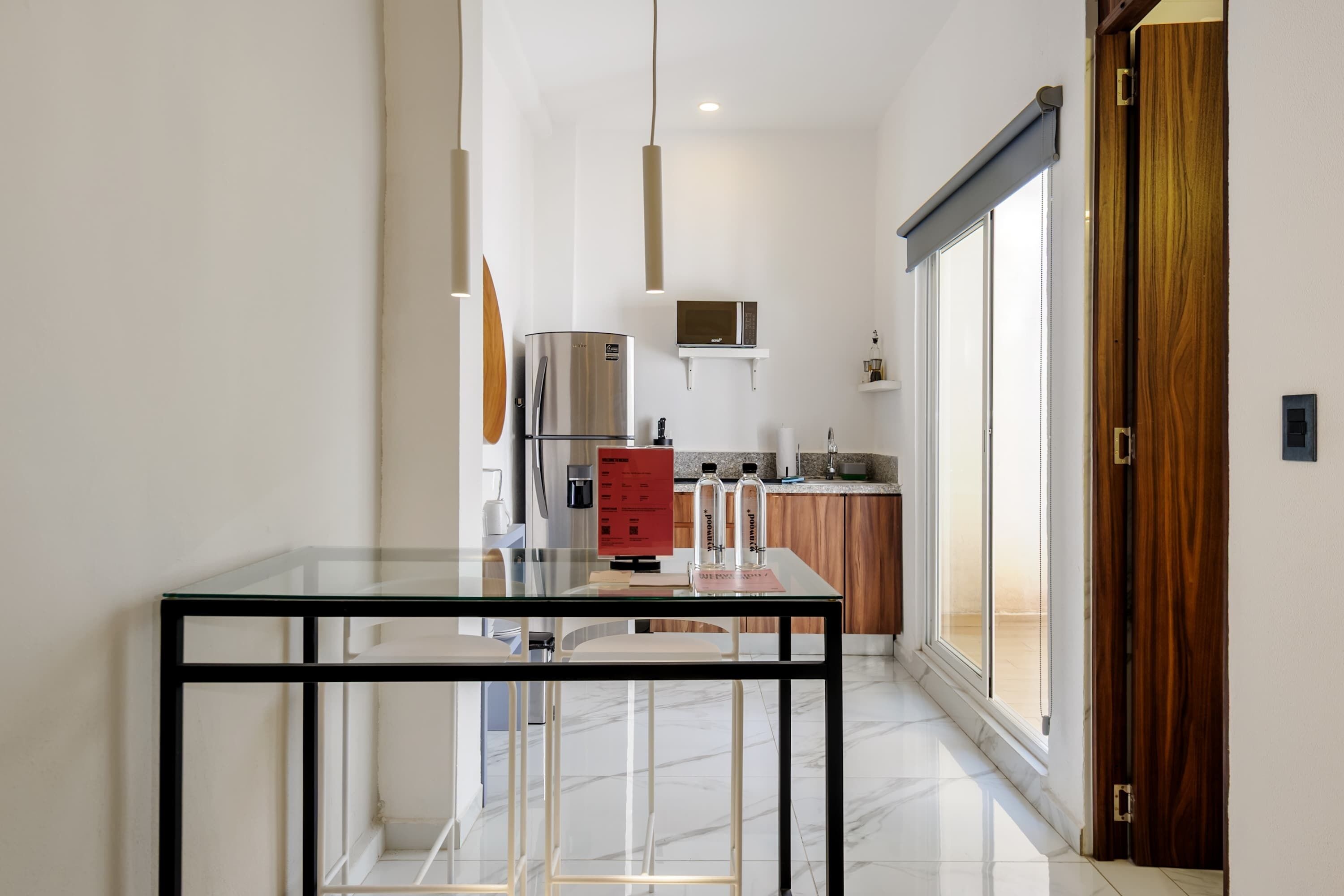 Fridge, microwave, stovetop, coffee/tea maker