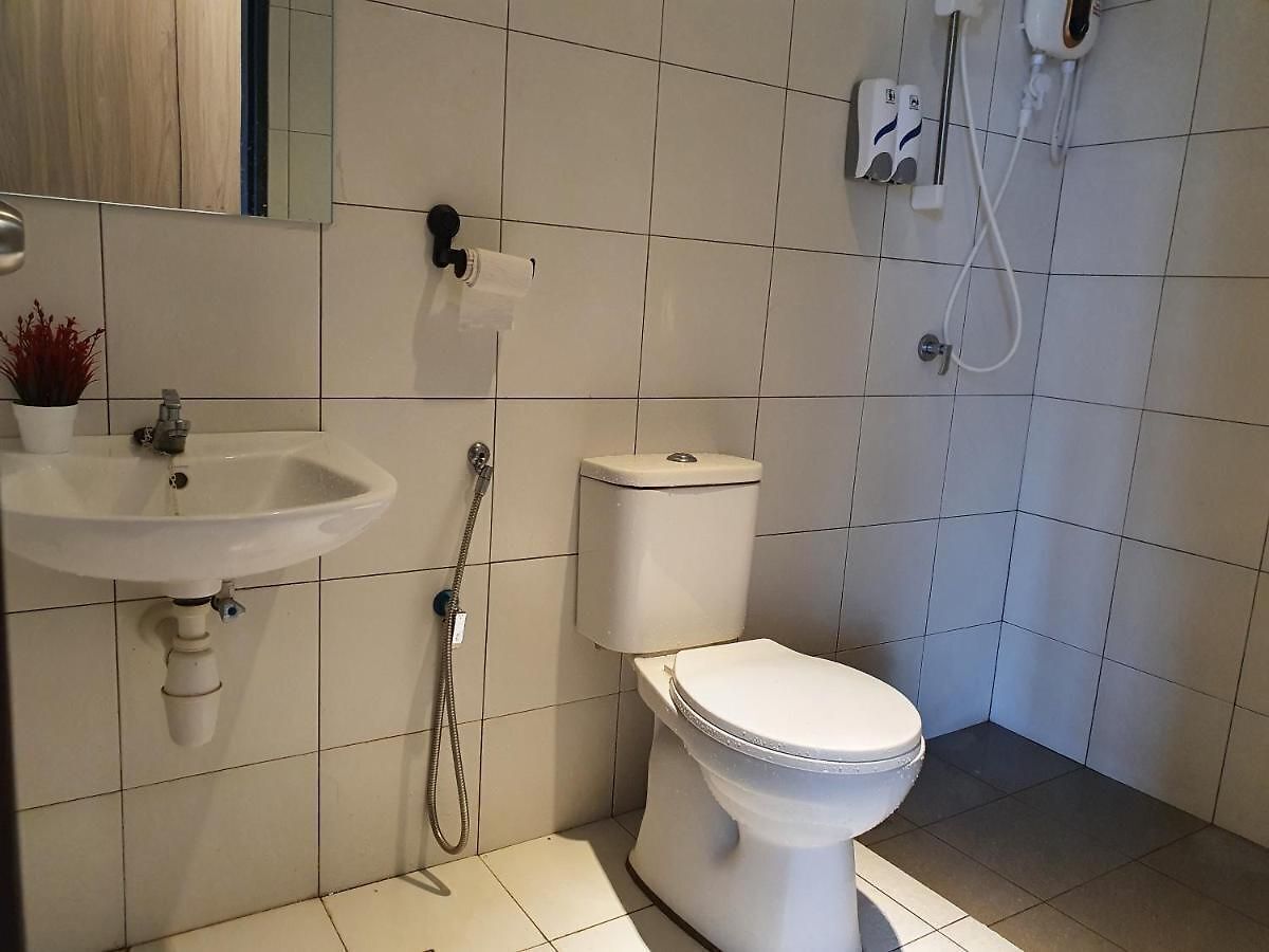 shower, slippers, bidet, towels