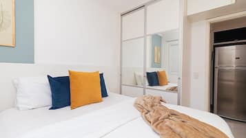 2 quartos, ferros/tábuas de passar roupa, acesso à internet