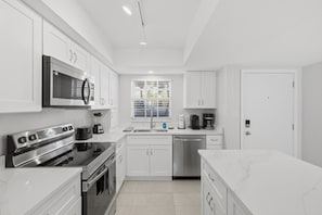 Fridge, microwave, oven, stovetop - Palm Bay Club on Siesta Key see our new bathrooms. (Siesta Key)