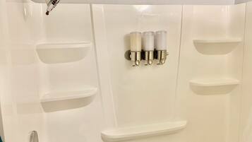 Hair dryer, towels, soap, shampoo