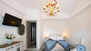 Apartamento standard, vista para o jardim | Frigobar, individualmente decorados, individualmente mobiliados
