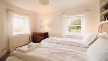 3 bedrooms, blackout drapes, iron/ironing board, travel crib