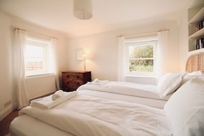 3 bedrooms, blackout curtains, iron/ironing board, travel cot