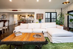 Smart TV, fireplace, books, computer monitors