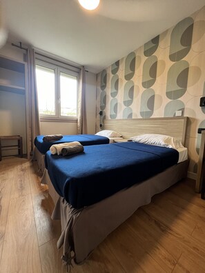 Twin Room, 2 Twin Beds | Desk, laptop workspace, iron/ironing board, free WiFi