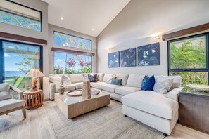 A modern living room with a sofa set, a coffee table, and artwork on the walls. - Wailea Elua, #1305^ 3 Bedroom Condo by RedAwning (Kihei)