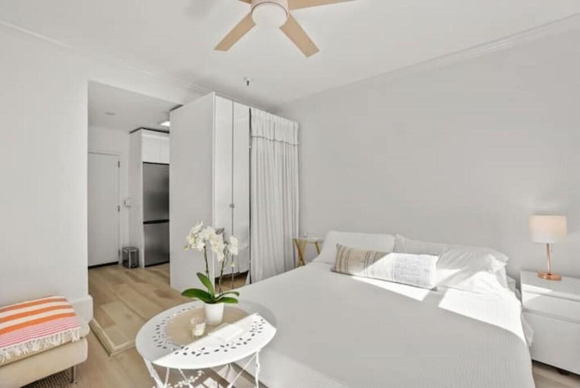 Open studio sleeping area and kitchenette